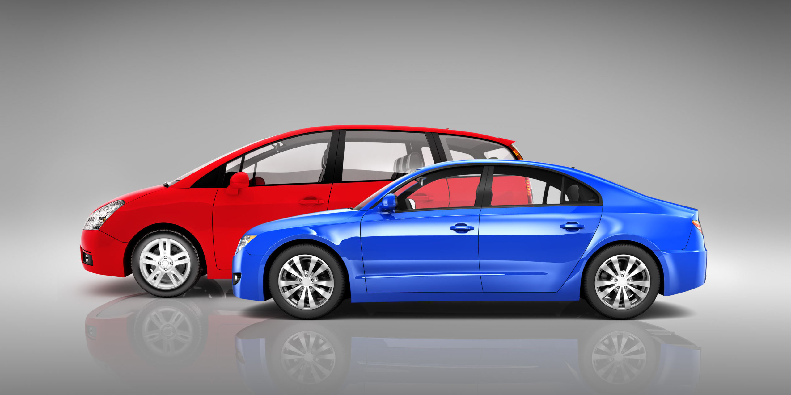 Two Modern Cars with Different Style Parked Side ways coches diesel VS coches gasolina